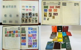 Box of sixteen assorted stamp albums containg stamps from around the world.
