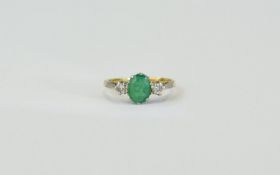 18ct Gold Set Emerald and Diamond 3 Stone Ring. The Central Emerald Flanked by Diamonds. Fully