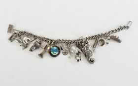 Vintage Silver Charm Bracelet, Loaded with 20 Charms, All Marked for Silver. 38.1 grams.