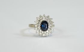 18ct White Gold Set Diamond and Sapphire Cluster Ring.