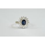 18ct White Gold Set Diamond and Sapphire Cluster Ring.