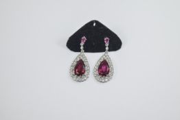 Pair of Faux Ruby and Diamond Drop Earrings, solitaire pear cut Burmese colour faux rubies,