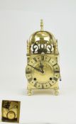 A Mid 20th Century Mechanical Brass Lantern Clock, by Lionel Peck / London.