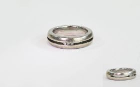 Silver Band Ring Set with 3 Small Diamonds. Marked 925.