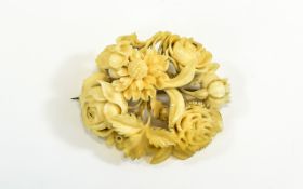 Antique Japanese Well Carved Ivory Brooch In The Form of a Bouquet of Flowers. 1.5 Inches High.