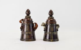 A Fine Pair of 19th Century Middle Eastern Burnished Copper Lidded Salt Canisters of Tapered Form