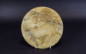 Chinese Hardstone Carved Roundel The Carved Front Depicting A Stylised Dragon,