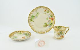 Nautilus Porcelain Trio, hand painted cup, saucer and plate with a design of ivy leaves and forget-