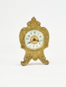 Ansonia Clock Co Fine Keyless Mechanical Gilt Metal Shaped Small Table Clock. c.1900.