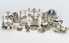Mixed Collection Of Silver Plated Ware To Include Baskets, Goblets, Candlesticks, Tea Service Etc.
