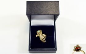 9ct Gold - Novelty Severed Hand Ring Set with Diamonds, Turquoise and Opals.