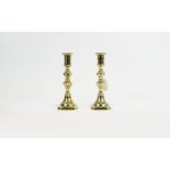 Pair of Brass Candlesticks, 8.5 inches in height.