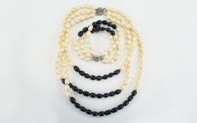 Peacock Black and White Fresh Water Pearl Three Strand Necklace and Matching Bracelet, the three