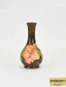 Moorcroft Tube lined Specimen Vase ' Coral Hibiscus ' Design on Chocolate Ground.