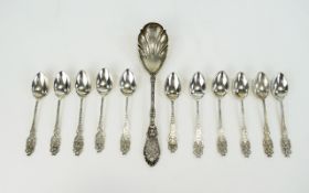 Edwardian Period Nice Quality Set of Eleven Ornate and Pierced Silver Teaspoons In Excellent