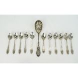 Edwardian Period Nice Quality Set of Eleven Ornate and Pierced Silver Teaspoons In Excellent