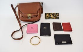 Faux Leather Cross Body Bag And Five Assorted Wallets.