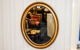 Regency Period - Nice Quality Oval Shaped Giltwood Wall Mirror with Multiple Ball Decoration to