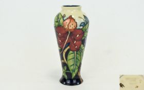 Moorcroft Modern Tube lined Vase. 'Tiger Lily' pattern, designer Nicola Slanley. Standing 8.