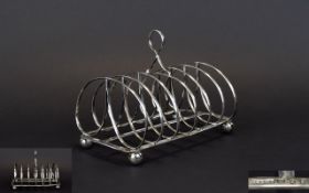 George IV - Period Silver 6 Tier Toast Rack, Raised on Ball Feet.