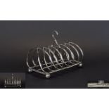 George IV - Period Silver 6 Tier Toast Rack, Raised on Ball Feet.