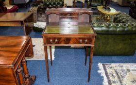 Writing Desk/Bureau Small dark wood desk with central drawer and three small top drawers,