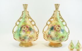 An Edwardian Pair of Large Ovoid Shaped Vases with Reticulated Arms. Floral Decoration to Each Vase.
