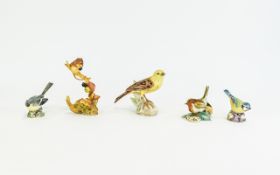 A Collection Of Ceramic Bird Figures 4 p