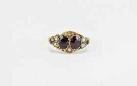 Garnet and Seed Pearl Ring, two oval cut