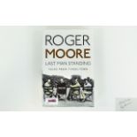 Roger Moore (James Bond) Autograph in his book 'Last Man Standing'