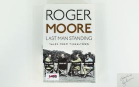 Roger Moore (James Bond) Autograph in his book 'Last Man Standing'