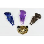Four Lea Stein Brooches, three being foxes, one deep blue lustre,