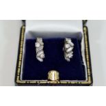 18ct White Gold Pair of Baguette and Brilliant Cut Diamond Earrings. Zig Zag Pattern.