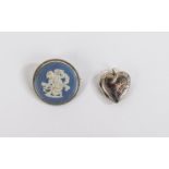 Wedgwood Pale Blue Jasper Brooch, a roundel showing Cupid preparing his bow,