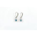 Pair of Mercury Mystic Topaz Drop Earrings, each earring comprising a pear cut solitaire topaz of 1.