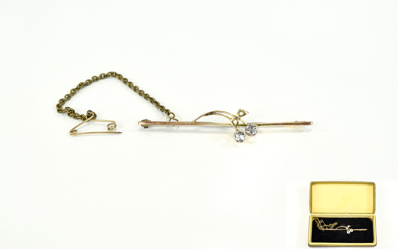 Victorian 9ct Gold and Diamond Set Bar Brooch, with Attached Gold Safety Chain. Marked 9ct.