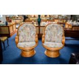 Conservatory Chairs Two in total fashioned from varnished, light bamboo effect bent wood.