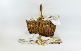 Small Quantity of Linen contained in a whicker basket.
