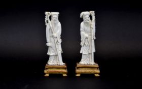 Chinese Pair of Early 20th Century Carved Ivory Figures of Wise Men / Sages Dressed In Flowing