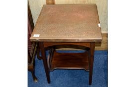 Occasional Table Small dark wood table in rustic style with bottom stretcher and planished copper
