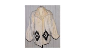 White Female Mink And Persian Lamb Ladies Jacket 3/4 length jacket in plush white mink with unusual