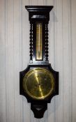 Barometer By Thomas Yates Of Preston Large dark wood mount with brass faced dial and thermometer,