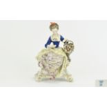 Volkstedt Hand Painted Porcelain Lady Figure In 19th Century Costume with Basket of Flowers Reading