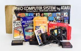 Atari 2600 Video Computer System, Model No CX-2600 + Star Wars, Space Invaders, Pac-Man,