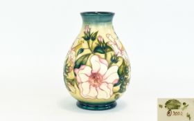 Moorcroft Modern Tube lined Bulbous Shaped Vase ' Hibiscus Moon ' Design. Designer Sian Leeper.