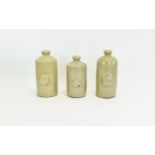 A Collection of Stoneware Hot Water Bottles from the 1940's (see photos. 10.75 inches high and 9.