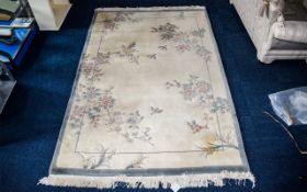 Large Pale Blue Oriental Style Rug Cream ground with blue borders and repeated oriental floral