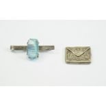 Silver Stamp Envelope with an engraved foliate design,