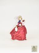 Royal Doulton Early Figurine ' Autumn Breezes ' HN1934. Designer L. Harradine. Height 7.5 Inches.