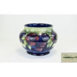 William Moorcroft Signed Large Jardiniere ' Pansy ' Design on Blue - Green Ground. c.1920's - 1930'